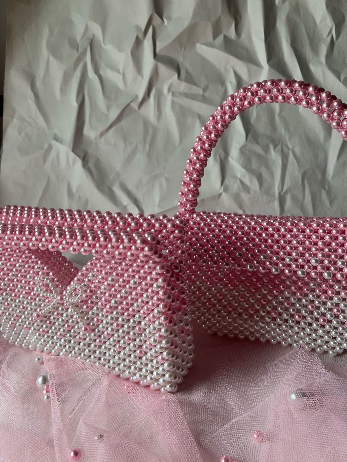 The Rosé Ombre Pearl Bow Clutch