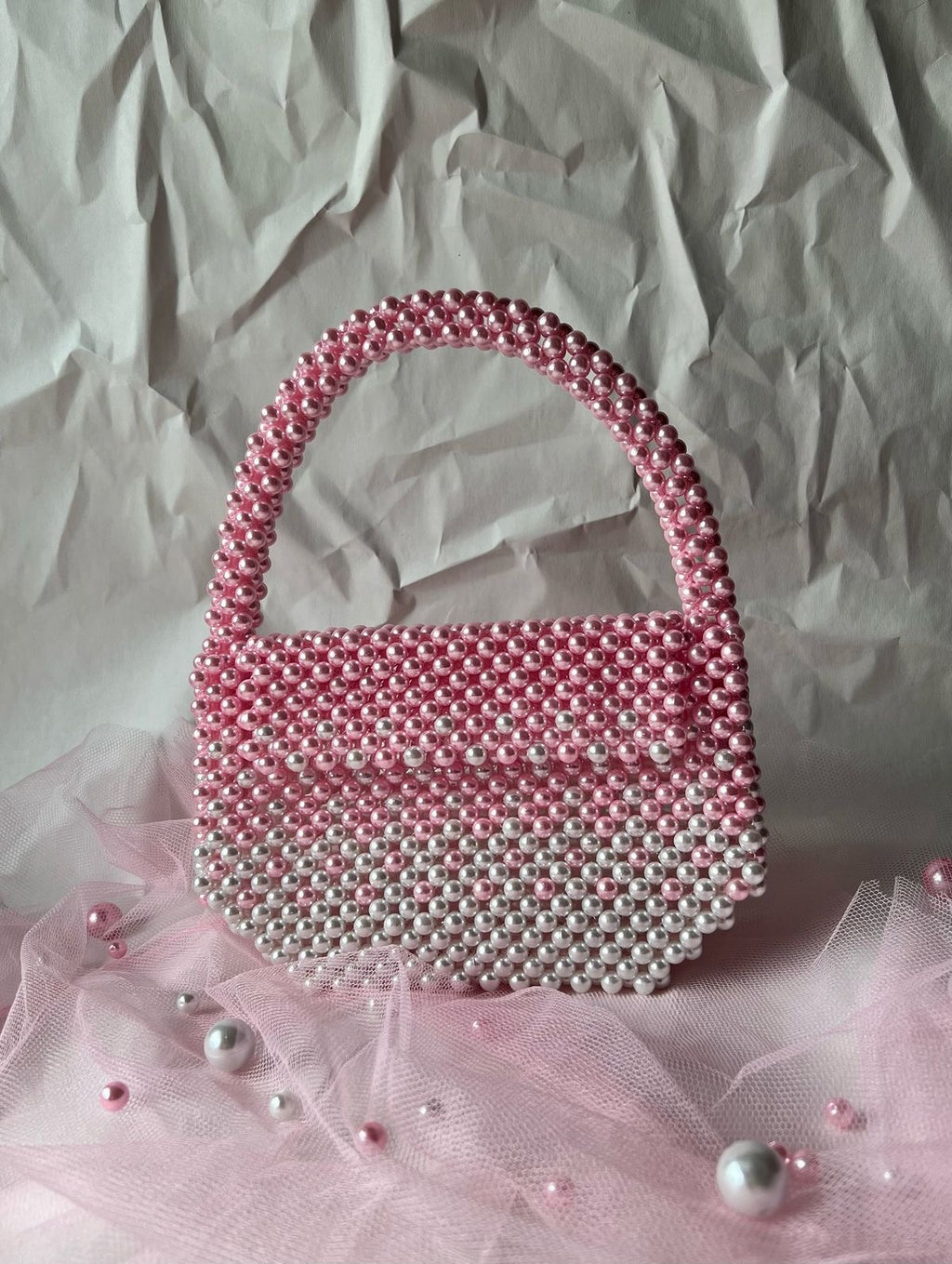 The Rosé Ombre Pearl Bow Clutch