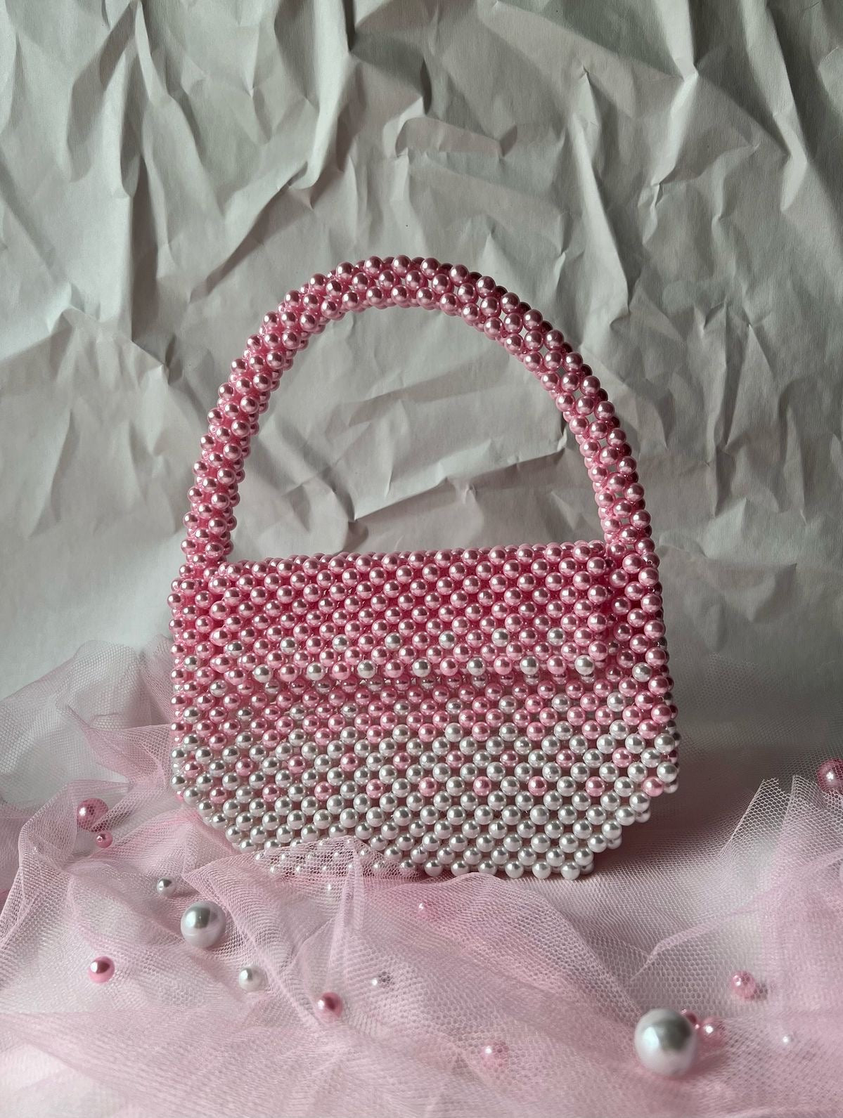 The Rosé Ombre Pearl Bow Clutch
